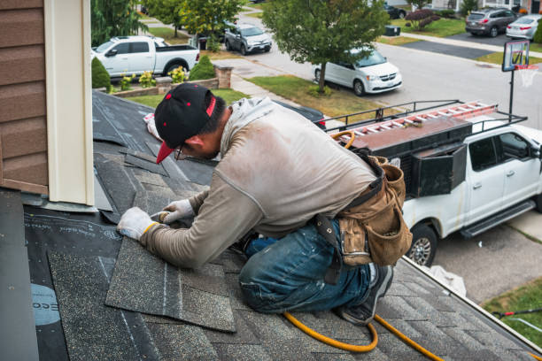 Professional Roof Leak Repair technician working in Falls, PA